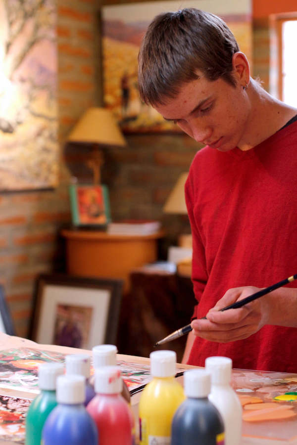 Boy painting.