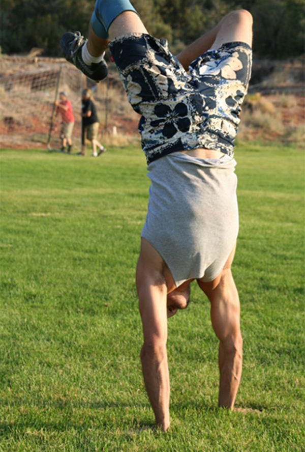 A man doing a handstand